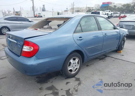 2002 Toyota Camry Le from USA, damaged, VIN JTDBE32K120041153